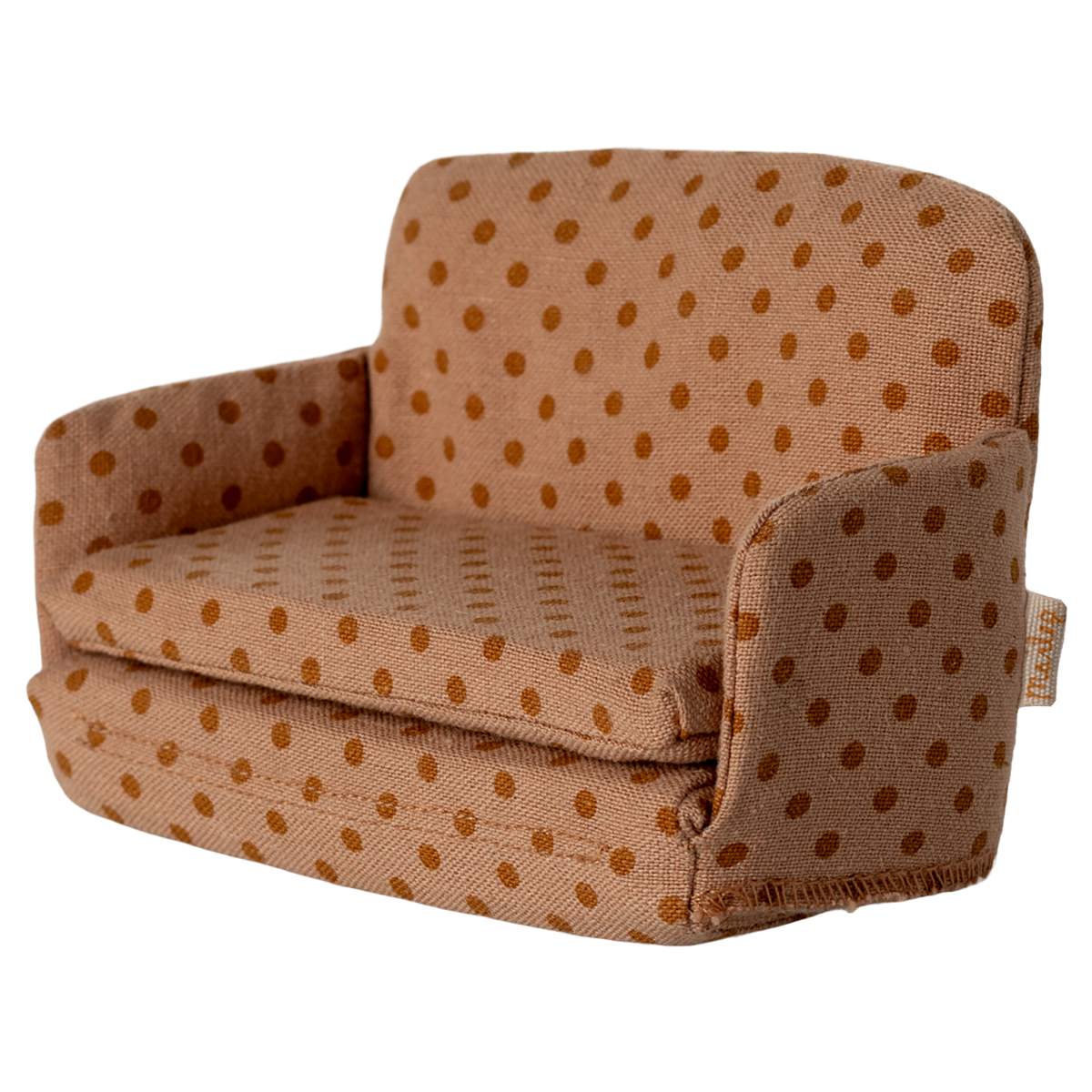 Miniature beige sofa with brown polka dots, featuring plush cushions and compact armrests. The playful design suggests a cozy, dollhouse ambiance.