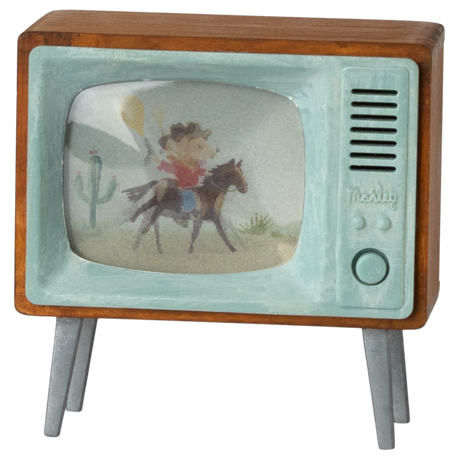Vintage TV model with wooden frame and aqua trim displaying a cowboy on a horse in a desert scene with a cactus, evoking nostalgia.