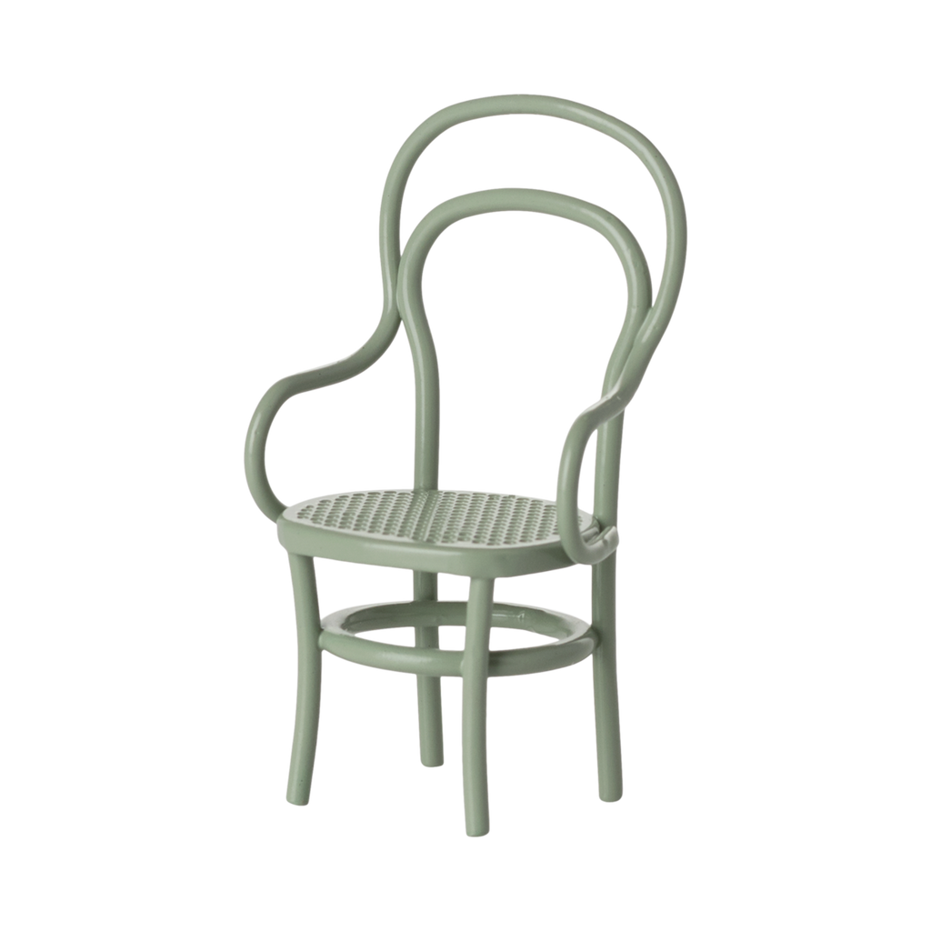 A miniature mint green chair with a woven seat and intricate curved backrest design. The chair has a vintage, elegant style against a white background.