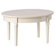 A miniature round, off-white wooden table with turned legs. The design is simple and elegant, conveying a classic and cozy feel.
