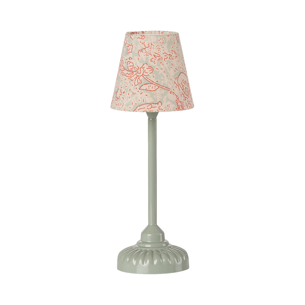 Elegant miniature table lamp with a smooth, green base and a fabric shade adorned with delicate red floral patterns, conveying a classic, cozy ambiance.