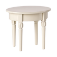 A miniature, round, cream-colored table with four turned wooden legs. The table has a smooth surface and a classic, minimalist design.