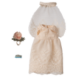 Delicate pink lace doll dress with a flared skirt, flowery headpiece, and light blue garter, set against a white background.