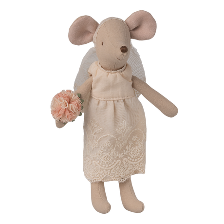 A small mouse doll wearing a lace dress and veil, holding a peach flower bouquet. The doll stands against a white background, evoking a whimsical tone.