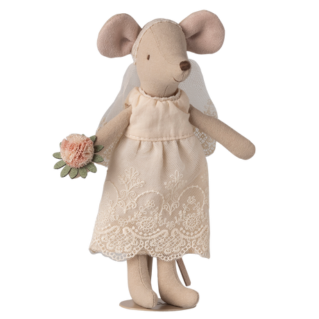 A cute fabric mouse doll wearing a delicate lace wedding dress and veil, holding a small bouquet of pink flowers, set against a white background.