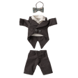 Black doll tuxedo set against a white background, featuring a small bow tie, a double-breasted jacket with white lining, and matching pants.