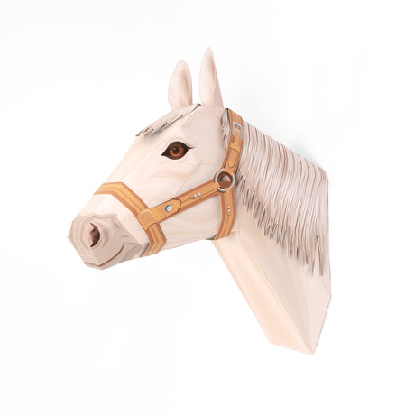 3D papercraft model of a white horse's head wearing a tan bridle, isolated on a white background.