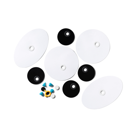 Makedo deco-props googlies craft pieces with black and white cardboard circles and colorful plastic screws on white.