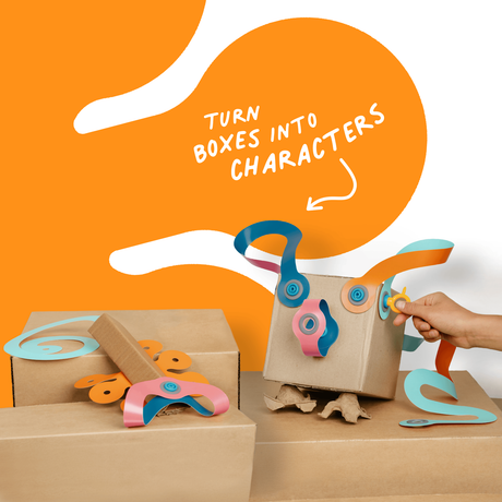 Cardboard boxes decorated into playful characters using colorful plastic connectors and paper twists.