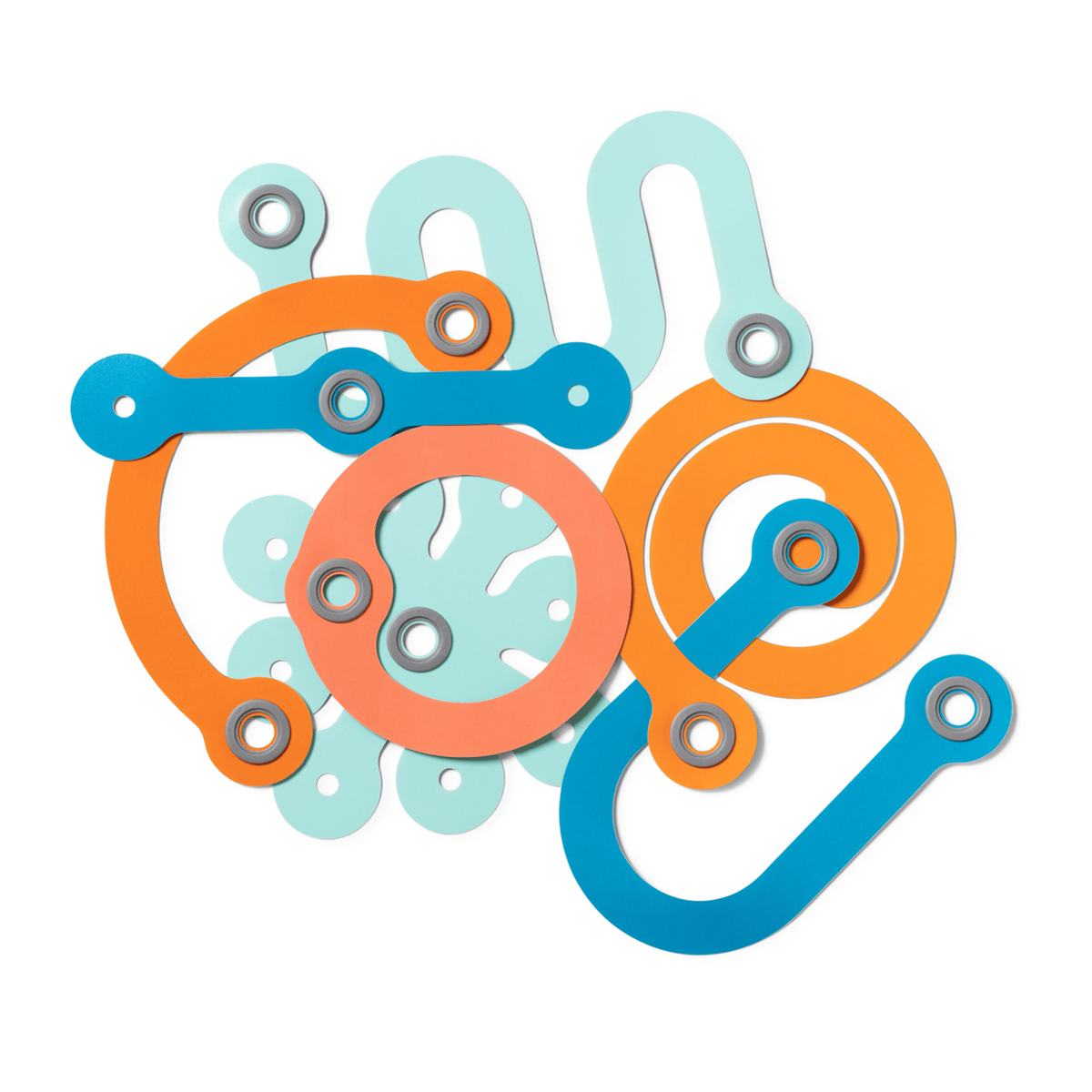 Abstract arrangement of colorful, curved toy connecting pieces in orange, light blue, dark blue, and peach.