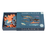 A 48 pcs. puzzle featuring various shark species on a blue background, packaged in a matchbox-sized box.