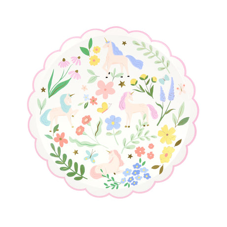A round, scalloped paper plate with a pastel pattern of unicorns, flowers, and butterflies.