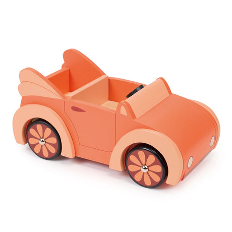 Orange wooden toy car with flower-patterned wheels.