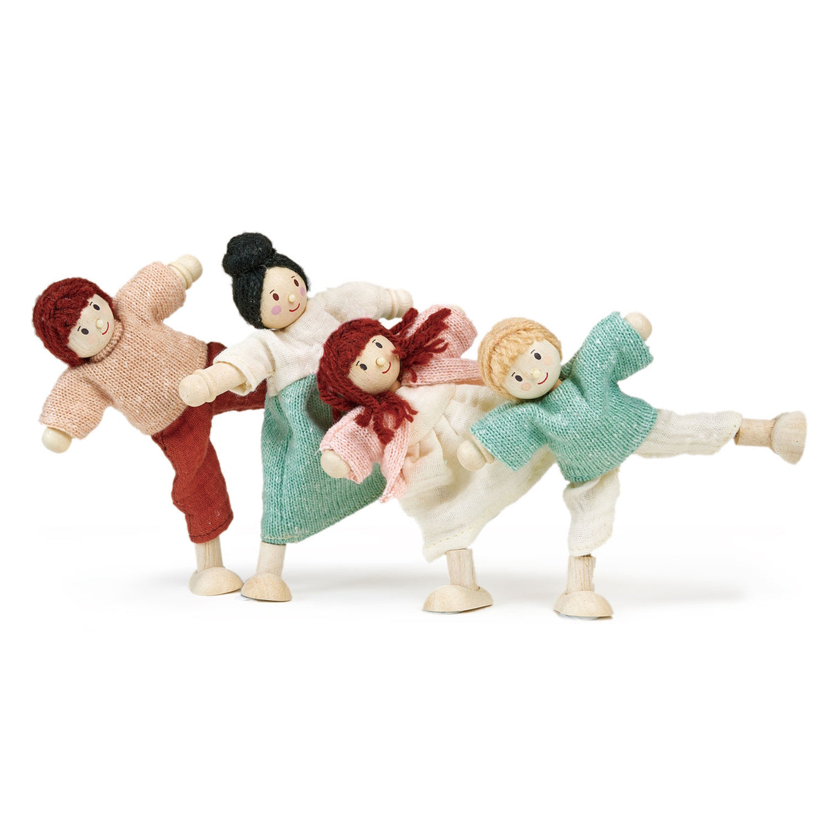Four bendable wooden family dolls posing dynamically together.