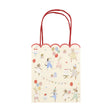 Meri Meri animal party bag with illustrations of dogs, cats, bunnies, and mice with balloons and cakes.