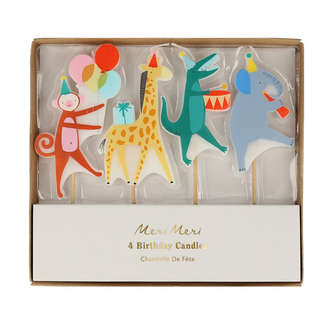 Meri Meri animal parade birthday candles featuring a monkey, giraffe, crocodile, and elephant in a gift box.