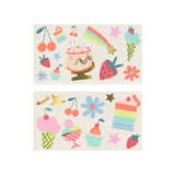 Colorful birthday temporary tattoos featuring cakes, cupcakes, ice cream, stars, and rainbow illustrations.