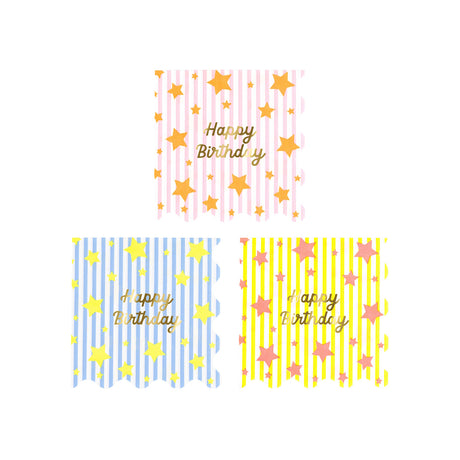 Meri Meri Bright Star Happy Birthday napkins in pink, blue, and yellow with gold foil stars and scalloped edges.