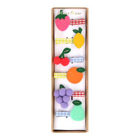 Meri Meri fruit hair clips set with felt strawberry, lemon, cherry, orange, grape, and pear designs on gingham ribbons.