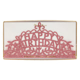 Pink glitter Happy Birthday party tiara in packaging with intricate filigree details for birthday celebrations.