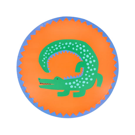 Green crocodile paper side plate with blue spots on an orange background, featuring a blue scalloped border.