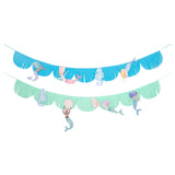 Meri Meri mermaid fringe garland set with blue and green scalloped streamers, mermaids, and seahorses for party decor.