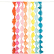 Meri Meri rainbow twisty fringe backdrop with colorful crepe paper streamers for party decorations on a white background.