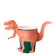 Meri Meri T-Rex party cup featuring a green paper cup with an orange dinosaur sleeve and tail for dinosaur themed parties.