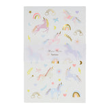 Meri Meri unicorn temporary tattoos sheet with gold foil details, rainbows, and stars for kids' parties.