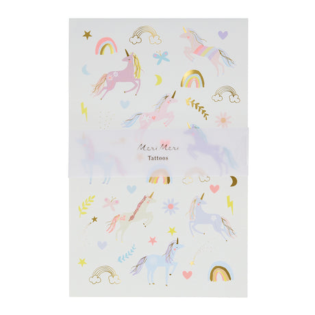 Meri Meri unicorn temporary tattoos sheet with gold foil details, rainbows, and stars for kids' parties.