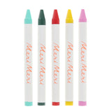Set of five Meri Meri crayons in mint, dark green, red, yellow, and pink with white branded wrappers.
