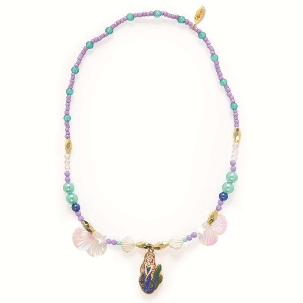 A colorful necklace featuring purple and teal beads, golden accents, and seashell charms. A central mermaid pendant adds a whimsical oceanic theme.
