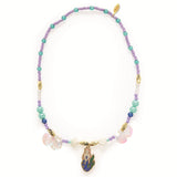 Alizee mermaid collection beaded necklace with iridescent seashell charms and enamel mermaid pendant in purple teal.