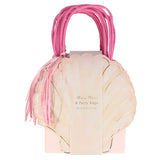 Pack of Meri Meri pink seashell-shaped party bags with hot pink handles and a tassel.