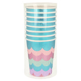 A stack of metallic blue paper cups with layered, colorful fringe detailing in a clear plastic tube.