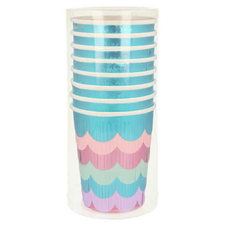 A stack of metallic blue paper cups with layered, colorful fringe detailing in a clear plastic tube.