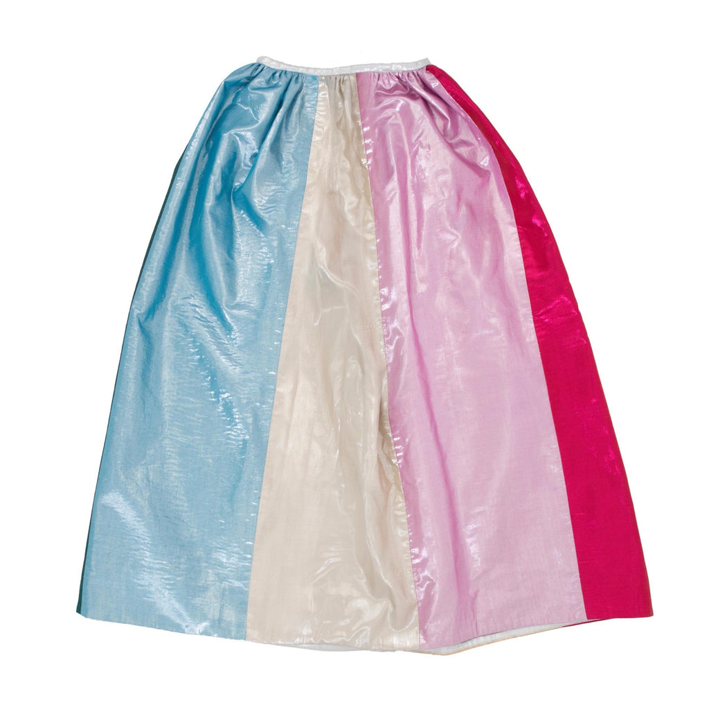 Featuring a shimmering rainbow-colored cape with gold trim and a matching star-topped wand, perfect for magical dress-up play.