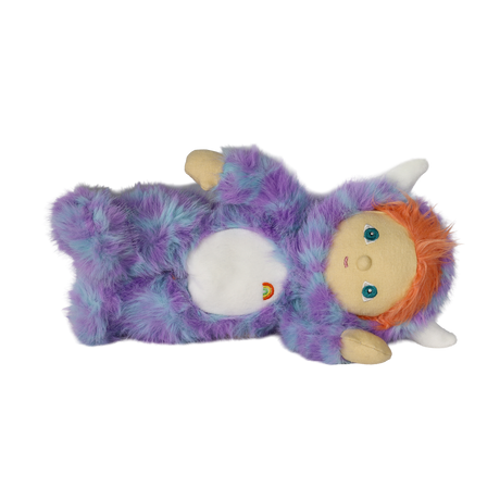 Plush doll lying on its side wearing a fuzzy purple monster suit with white horns and orange hair.