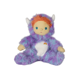 Seated plush doll in a fuzzy purple monster suit with white horns, orange hair, and a rainbow.