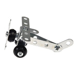 Metallic toy airplane made from perforated metal strips, nuts, and bolts. Features small black wheels and a shiny silver finish on a white background.