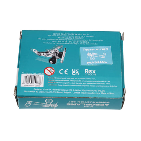 Turquoise box of a mini airplane construction set with an image of a metal airplane model. Includes text in multiple languages and a warning for ages 0-3.