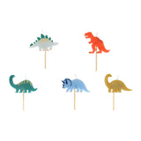Five dinosaur birthday candles on wooden picks, including a Stegosaurus, T-Rex, and Triceratops.