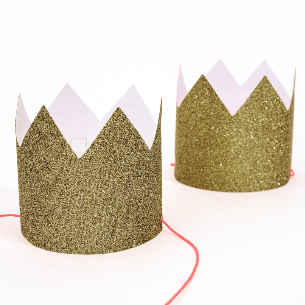 Featuring small, sparkly gold crowns with elastic bands - perfect for party guests, dress-up, or festive celebrations.