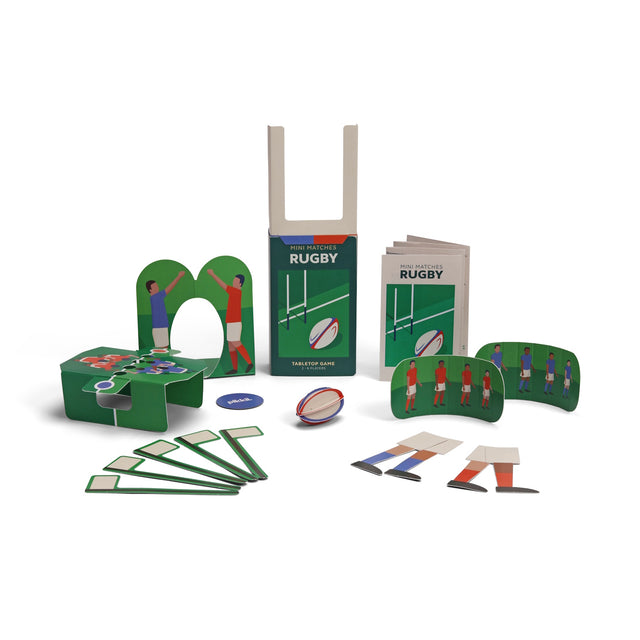 Mini Matches Rugby tabletop game set including box, mini football, goalposts, and game pieces.