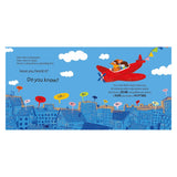 Children's book spread showing a red airplane flying over a city beneath a bright blue sky.