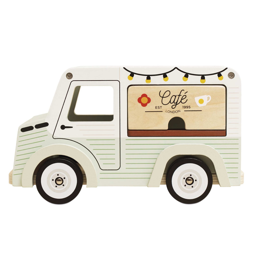 Toy van with a vintage café theme. Light green with cafe signs, decorative lights, and charming details. Whimsical and nostalgic feel.