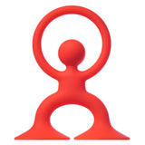 A red, stylized human figure with a circular head and outstretched arms forming a ring. The figure stands on wide, flared feet, conveying balance and playfulness.