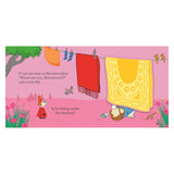 Little My looking at a character hiding behind a yellow blanket on a clothesline in Moominvalley.