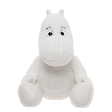 A plush toy resembling a white, hippo-like character sits with a friendly expression. It has round eyes, small ears, and an inviting, soft appearance.