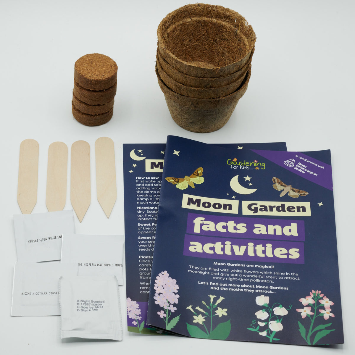 Moon Garden kit contents: fiber pots, soil discs, wooden markers, seed packets, and an activity booklet.